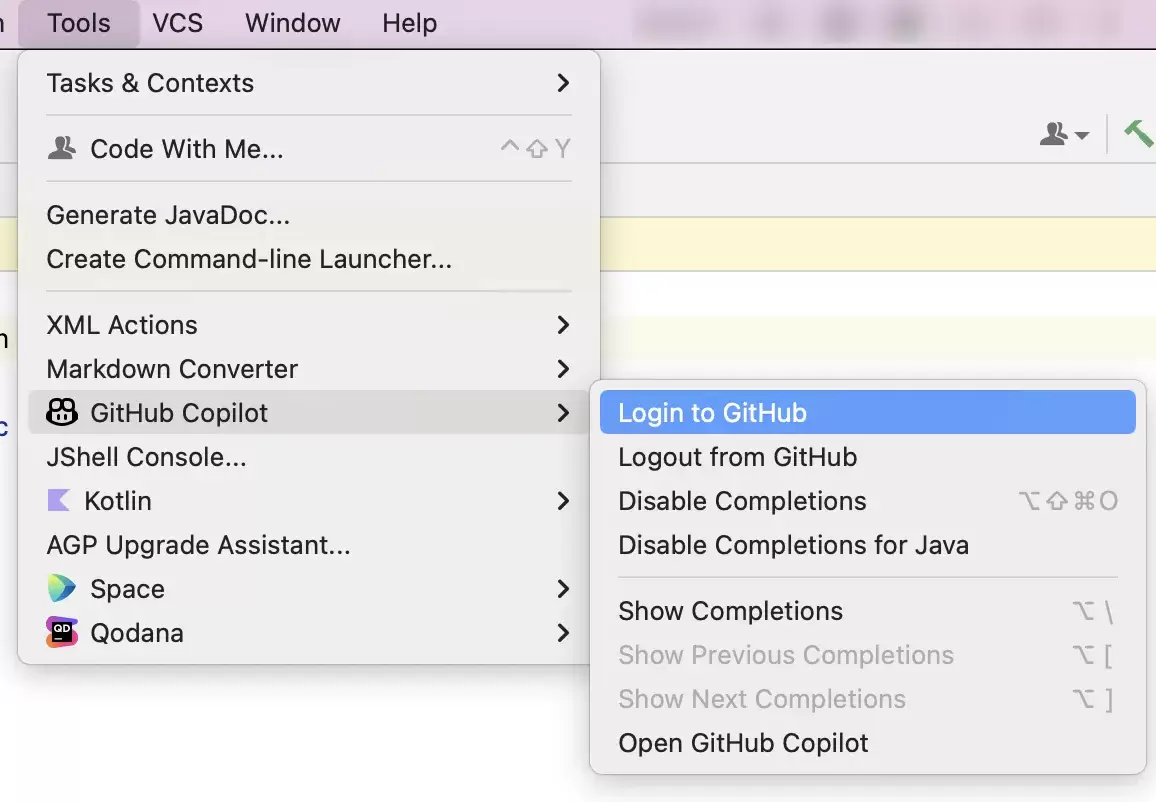 JetBrains IDE 的 Tools 菜单展开 GitHub Copilot 子菜单，Login to GitHub 选项被高亮